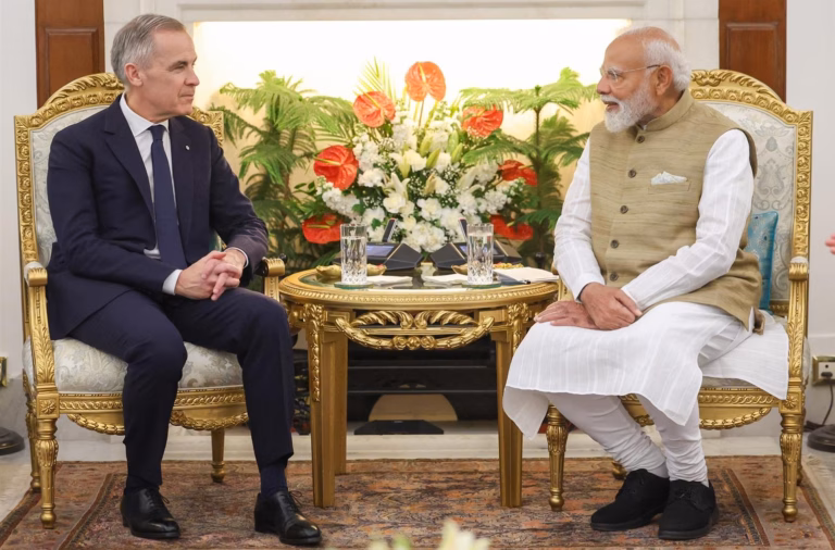 Carney, Modi